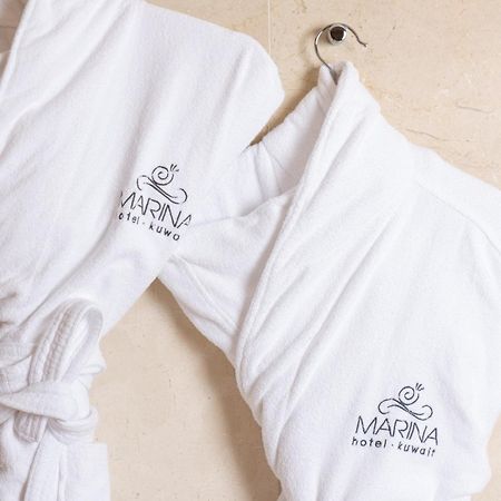 Marina Hotel Κουβέιτ Εξωτερικό φωτογραφία A bathrobe